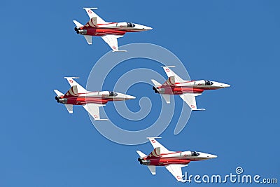 Patrouille Suisse formation display team of the Swiss Air Force flying Northrop F-5E fighter aircraft joined by the Swiss PC-7 tea Editorial Stock Photo