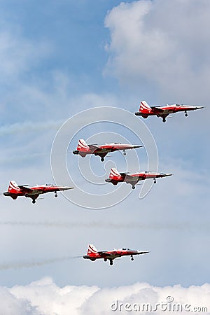 Patrouille Suisse formation display team of the Swiss Air Force flying Northrop F-5E fighter aircraft. Editorial Stock Photo