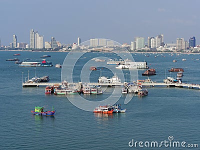 Pattaya scenery with tourists transit onto ferry at Bali Hai pier Editorial Stock Photo