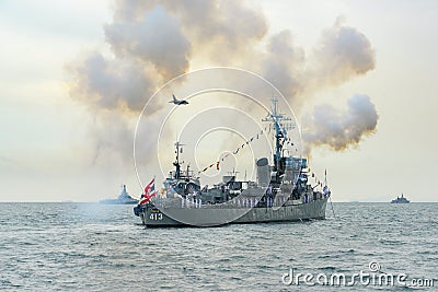 Navy warship gunning salute on sea in international fleet review Editorial Stock Photo