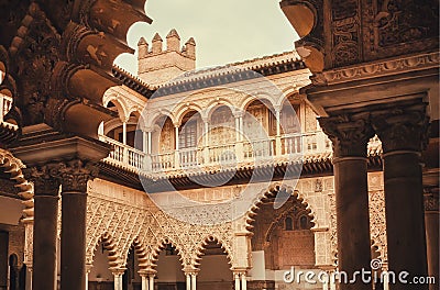 Pattenes of the arches inside Alcazar royal palace in Mudejar architecture style, Seville Editorial Stock Photo