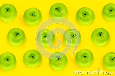 Pattern apples. Fresh and juicy green apples on the yellow color background, top view Stock Photo
