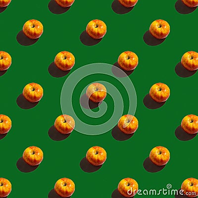 pattern apples on a green background with shadows, a repeating picture wallpaper or background on a smartphone Stock Photo