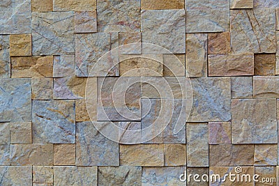 Pattern brown color of old stone marble wall uneven cracked real stone wall surface with cement Stock Photo