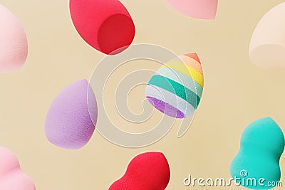 Pattern from color cosmetic beauty blender sponges Flying colored sponges different shape. Stock Photo