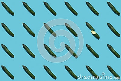 a pattern of cucumbers on a blue background. Stock Photo