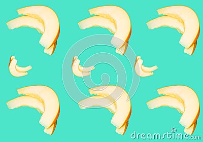 Pattern with cut slices of juicy melon on a blue background Stock Photo