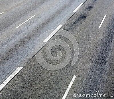 Pattern of empty highway in grea with median stripes Stock Photo