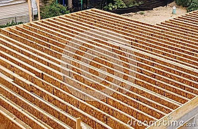 A pattern of floor joist in a new construction Stock Photo
