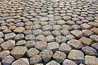 Pattern of geometrical shaped basalt stones Stock Photo