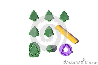 Pattern of modeling clay christmas trees on a white isolated background Stock Photo