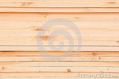 Pattern of stacked rectangular wooden beam timber at sawmill lumberyard Stock Photo