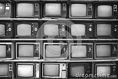 Pattern wall of pile black and white retro television Stock Photo