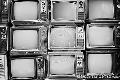 Pattern wall of pile black and white retro television Stock Photo