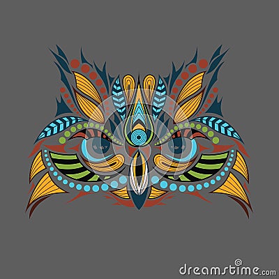 Patterned colored head of the owl. African / indian / totem / tattoo design. It may be used for design of a t-shirt, bag, postcard Vector Illustration