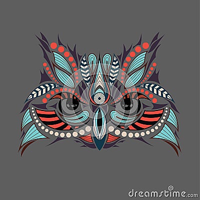 Patterned colored head of the owl. African / indian / totem / tattoo design. It may be used for design of a t-shirt, bag, postcard Vector Illustration