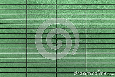 Patterned green cement fence wall texture Stock Photo