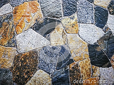 Patterned tile flooring mimics natural stone. Stock Photo