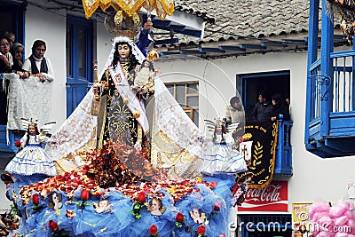 PAUCARTAMBO demons and devils called SAGRAS climbed to the balconies of the town trying to tempt the Virgin of Carmen with Editorial Stock Photo