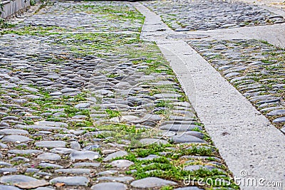 paved street road made of stone on the ancient streets of the old city Stock Photo