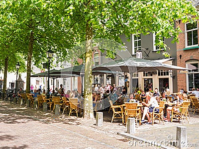 Pavement cafe with people in Wijk bij Duurstede, Netherlands Editorial Stock Photo