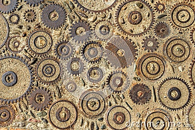 Pavement texture with gears and bricks in Montjuic, Barcelona, Spain. Stock Photo