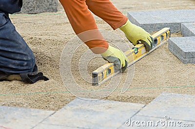 Paver leveling sand Stock Photo