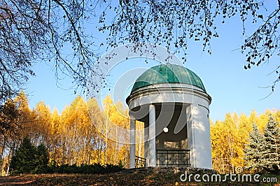 Pavilion in a park with yellow birch trees Stock Photo