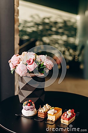 Pavlova dessert made of fresh meringue with cream cheese decorated with berries Stock Photo