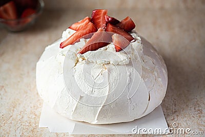 Pavlova - Famous Australian dessert with strawberries. Close up Stock Photo