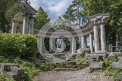 View of the ancient colonnade of Apollo on a July day. Pavlovsk Editorial Stock Photo