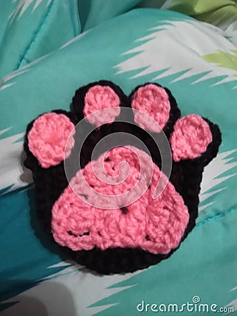 Pawprint, crochet, black, pink, hobby Stock Photo
