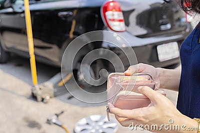 Pay for car repairs Stock Photo