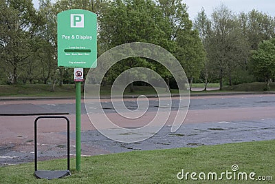 Pay and display carpark sign pay ticket fine vehicle safe park spaces empty car park Stock Photo