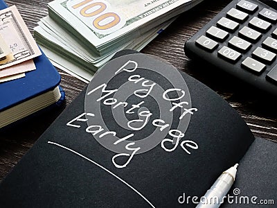 Pay off mortgage early memo on the page. Stock Photo