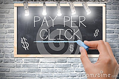 Pay per click, online marketing strategy, handwriting on blackboard Stock Photo