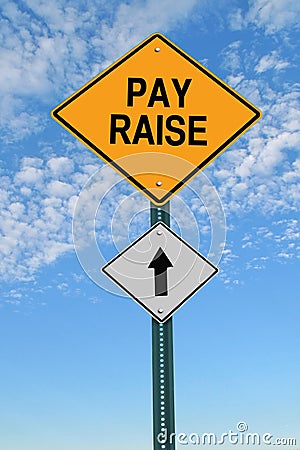Pay raise ahead roadsign Stock Photo