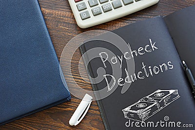 Paycheck Deductions are shown on the business photo using the text Stock Photo