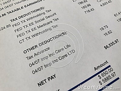 Paycheck financial deduction detail Stock Photo