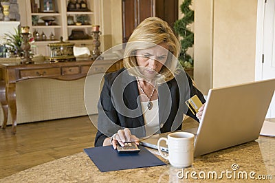 Paying bills at home Stock Photo