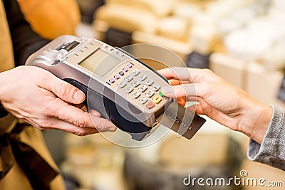 Paying with card in the food store Stock Photo