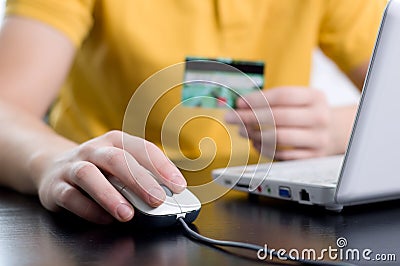 Paying with a credit card online Stock Photo