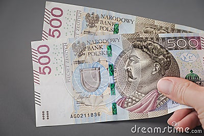 Paying, giving, receiving polish money. 500 zloty Stock Photo