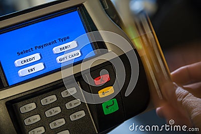 Payment terminal with motion card swipe Stock Photo