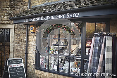 The Payne Bridge Gift Shop in Bourton-on-the-Water, a beautiful famous small village in rural Cotswolds area of England. Taken in Editorial Stock Photo