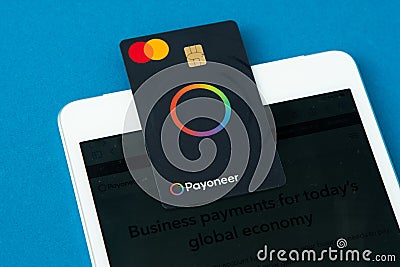Payoneer credit card. Master Card. Global international payment system. Ukraine, Kyiv - February 4, 2024 Editorial Stock Photo
