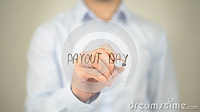 Payout Day , Man writing on transparent screen Stock Photo