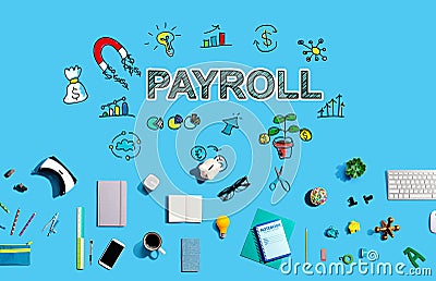 Payroll with electronic gadgets and office supplies Stock Photo