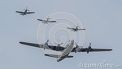 PB4Y-2 Privateer Escorted by P-51 Mustangs Editorial Stock Photo