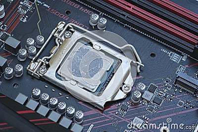 Pc cpu with dried thermal paste on hi tech motherboard,computer components chip Stock Photo